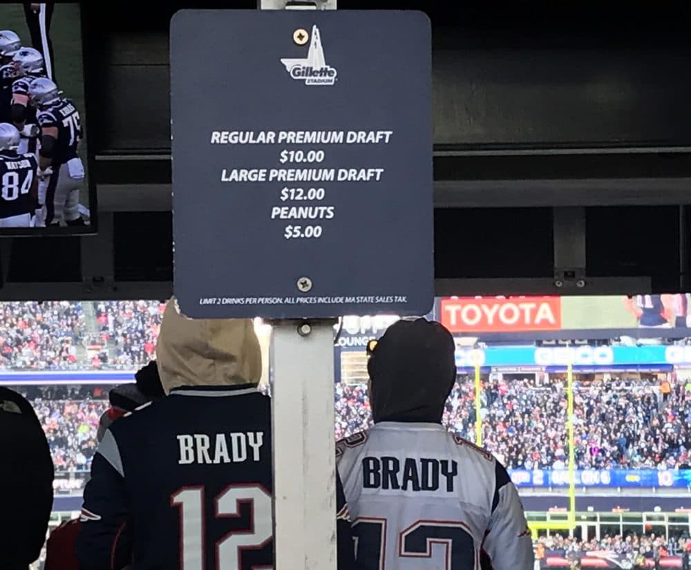 Want a beer while watching the Patriots play at Gillette Stadium? It'll cost you at least $10 for a draft. (Shira Springer/WBUR)