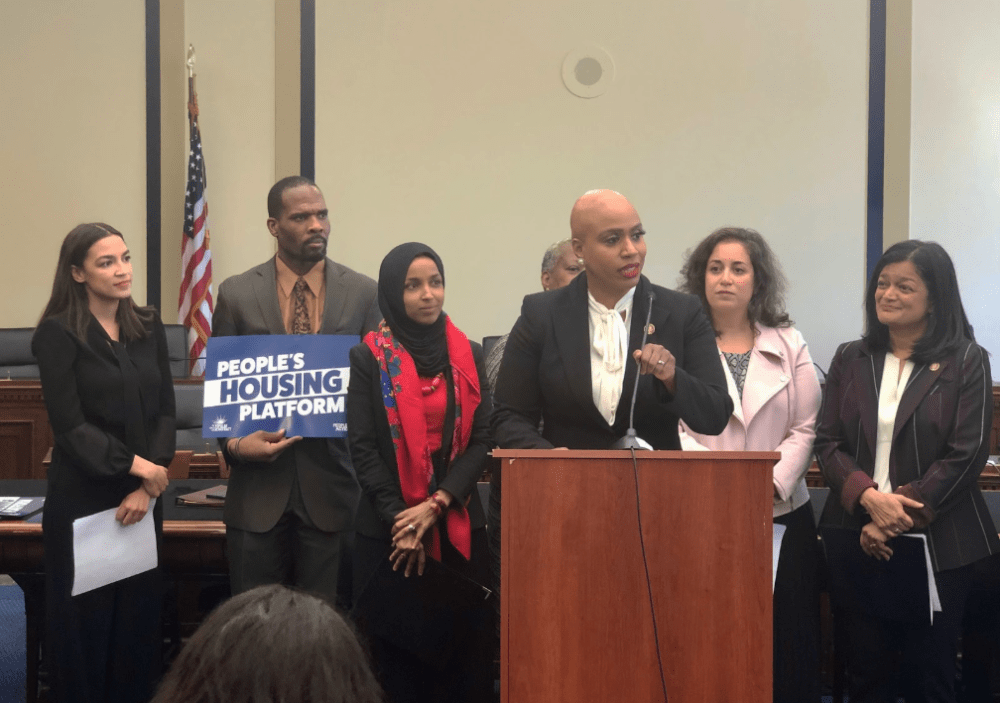 Rep. Ayanna Pressley and other lawmakers announce the "People's Housing Platform." (Kimberly Atkins/WBUR)