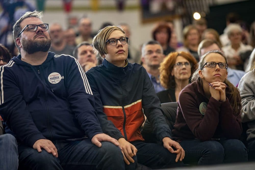 Rally goers listen to Warren at West High School in Iowa City, Iowa. (Jesse Costa/WBUR)