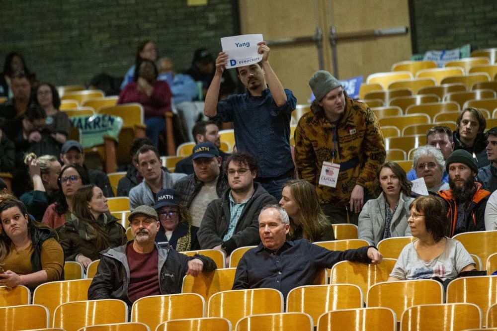 The leader of Andrew Yang supporters identify themselves at the caucus at Central Campus High School in Des Moines. (Jesse Costa/WBUR)