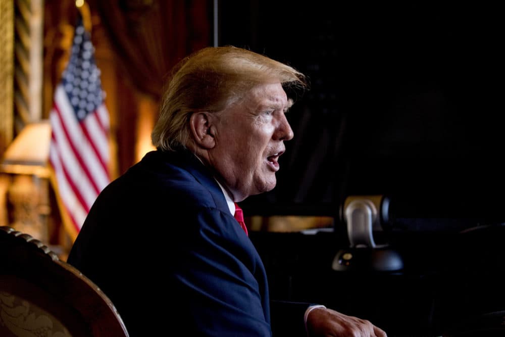 In this Dec. 24, 2019 photo, President Donald Trump speaks to members of the media following a Christmas Eve video teleconference with members of the military at his Mar-a-Lago estate in Palm Beach, Fla. (Andrew Harnik/AP)
