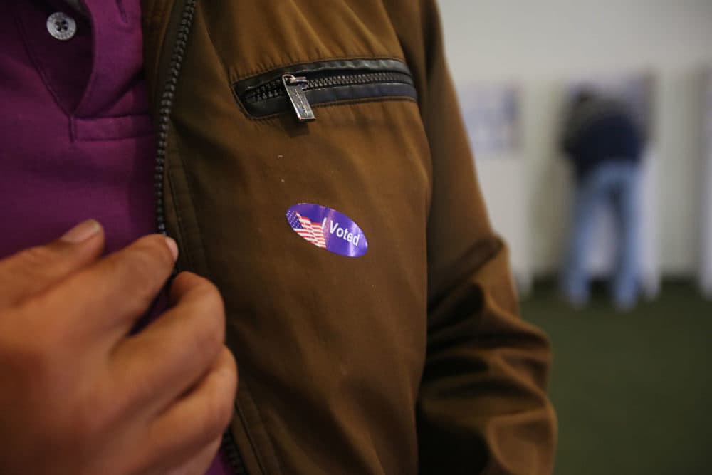 Ibram Kendi argues in The Atlantic that we should look at young voters, voters of color and especially young voters of color as "the other swing voters." (Bill Wechter/AFP/Getty Images)