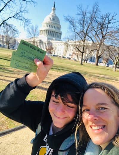 Mary Finn and Aidan Hollinger-Miles with their tickets to watch the impeachment trial. (Courtesy)