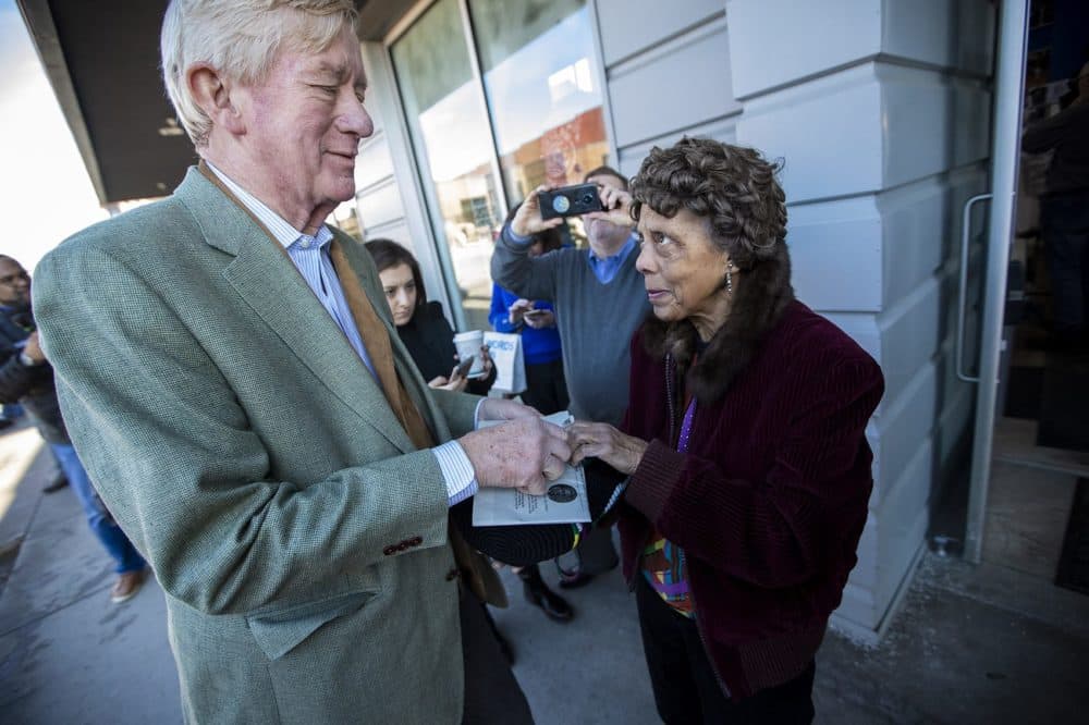 Weld signs an autograph during a campaign stop in Des Moines, Iowa. (Jesse Costa/WBUR)