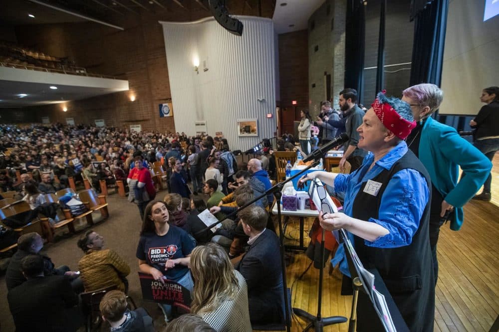 Co-chair of the caucus at Central Campus High School Deb Copeleand attempts to bring the room to order. (Jesse Costa/WBUR)