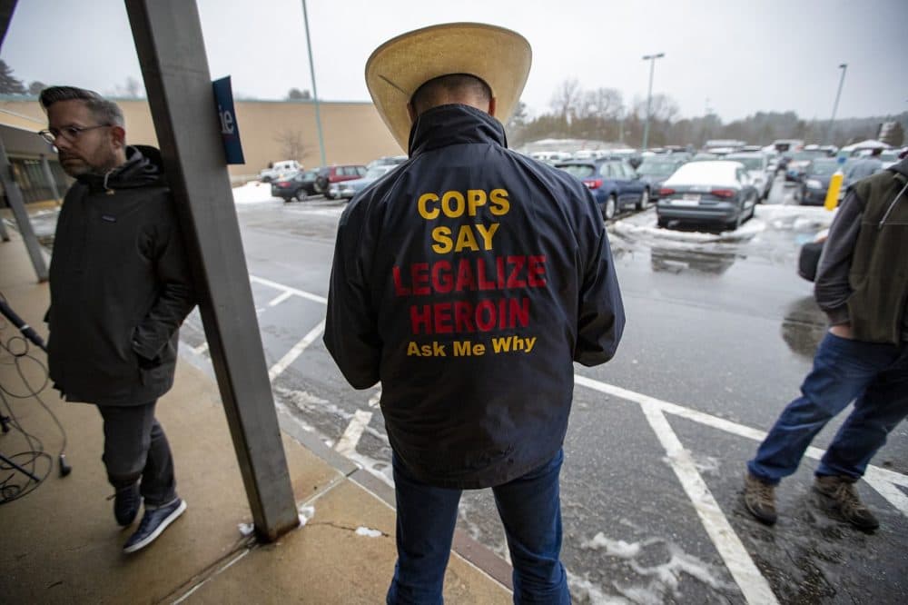 Howard Wooldridge, a former Texas detective who now lobbies on behalf of universal drug legalization, stood outside of Sanders headquarters. (Jesse Costa/WBUR)