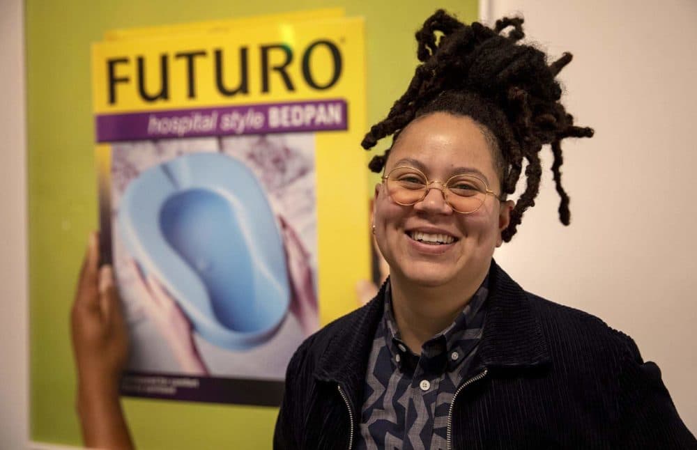 Curator Meg Onli at MIT's exhibit "Colored People Time: Mundane Futures, Quotidian Pasts, Banal Presents" at the List Visual Arts Center. (Robin Lubbock/WBUR)