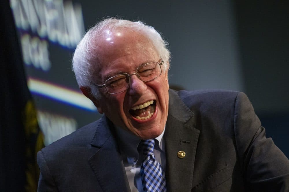 Sanders laughs at a question posed to him during a Q&A session after his speech at St.Anselm College in Manchester, N.H. on Feb. 7. (Jesse Costa/WBUR)