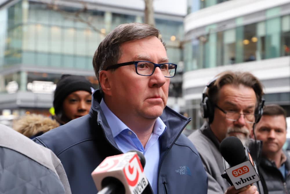 Rep. David Nangle had no comment as he walked from the Moakley Federal Courthouse to an idling car after pleading not guilty to numerous campaign finance-related charges including wire fraud and bank fraud. (Sam Doran/SHNS)