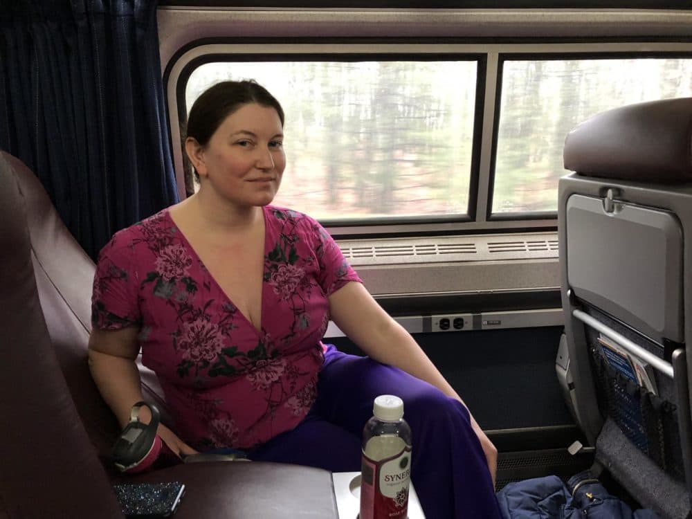 Kerry Brogan on board Amtrak's Lake Shore Limited train. (Alden Bourne/NEPR)
