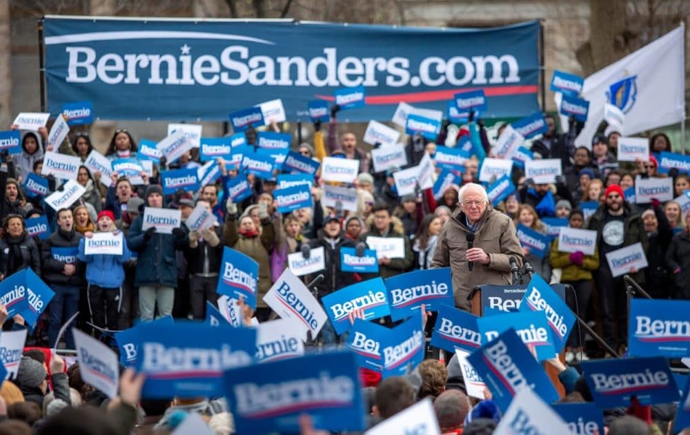 Bernie Sanders receives a warm welcome from supporters on a cold Boston Common. (Robin Lubbock/WBUR)