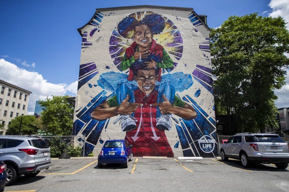 This June 2019 photo features the mural, "Breathe Life," by the artist Problak Gibbs at 808 Tremont Street in Roxbury. (Jesse Costa/WBUR)