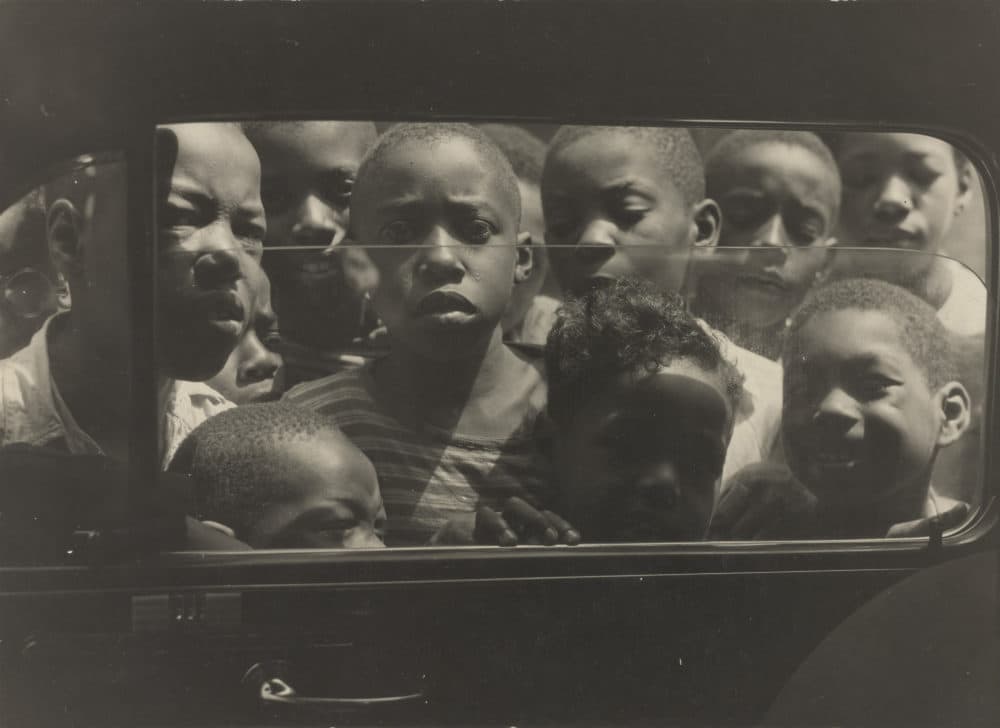 Gordon Parks, "Boys Looking in Car Window, Harlem," August 1943.
(Courtesy of and copyright The Gordon Parks Foundation)