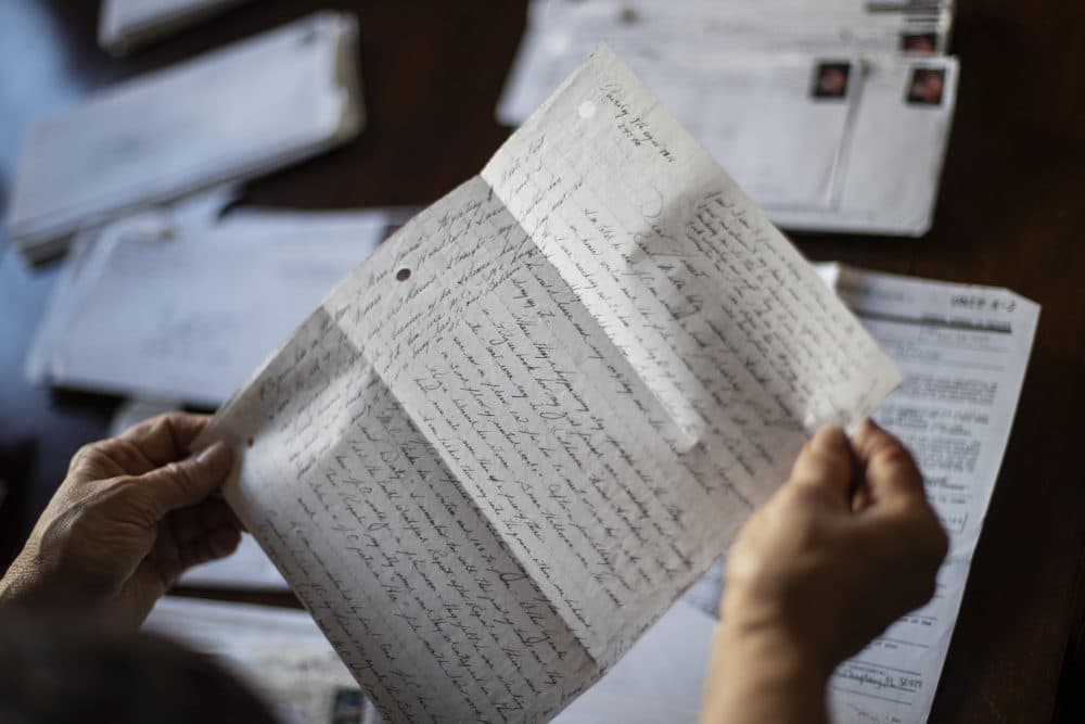 Janet Uhlar holds a letter she received through her correspondence with James "Whitey" Bulger, "Had I known, I would have absolutely held off on the murder charges," said Uhlar, noting that Bulger's role in the experiments was never mentioned during his extended federal trial. (David Goldman/AP)