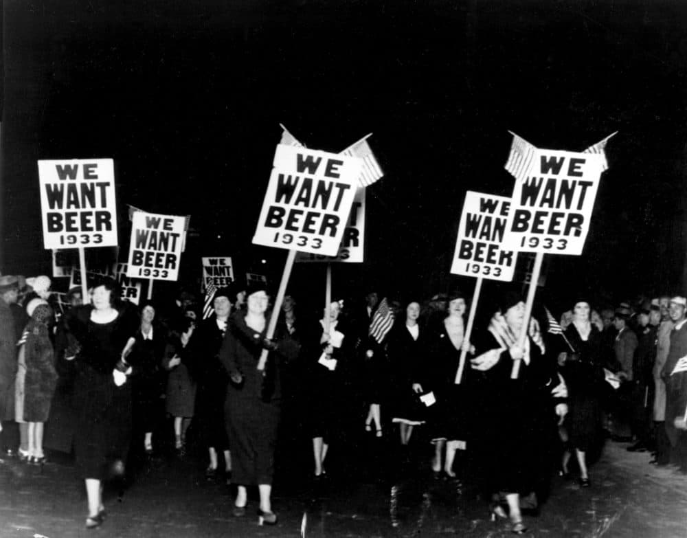 Women turn out in large numbers, some carrying placards reading "We want beer" for the anti prohibition parade and demonstration in Newark, N.J., Oct. 28, 1932.  More than 20,000 people took part in the mass demand for the repeal of the 18th Amendment.  (AP Photo)