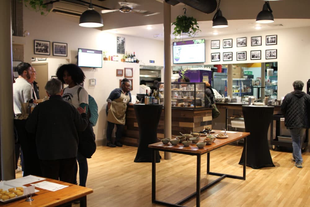 Customers stop in for Haley House's community tasting event as part of its reopening. (Paris Alston/WBUR)