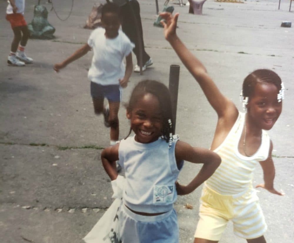 The author pictured, center, with her cousin and her twin brother, Andre, at a playground behind 1850 Washington Street. (Courtesy)