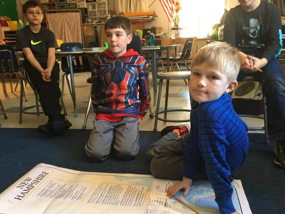 Joseph Carroll (center) and Jack Goodridge (right) answer questions about the primary. (Sarah Gibson/NHPR)