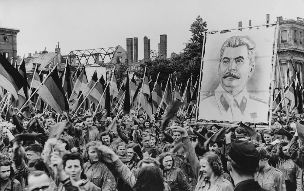 A Soviet-sponsored youth rally in the Lustgarten in Berlin, Germany, 1st June 1950. The youth carry huge portraits of Communist leaders such as Joseph Stalin (pictured). (FPG/Getty Images)
