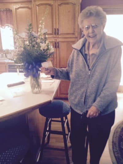 Audrey and the flowers "from" Coach K. (Dian Versteeg)
