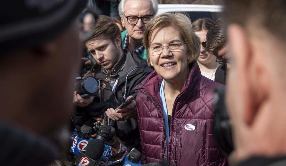 Sen. Elizabeth Warren talks with the media after voting on Tuesday, March 3, 2020 in Cambridge, Mass. (Robin Lubbock/WBUR)