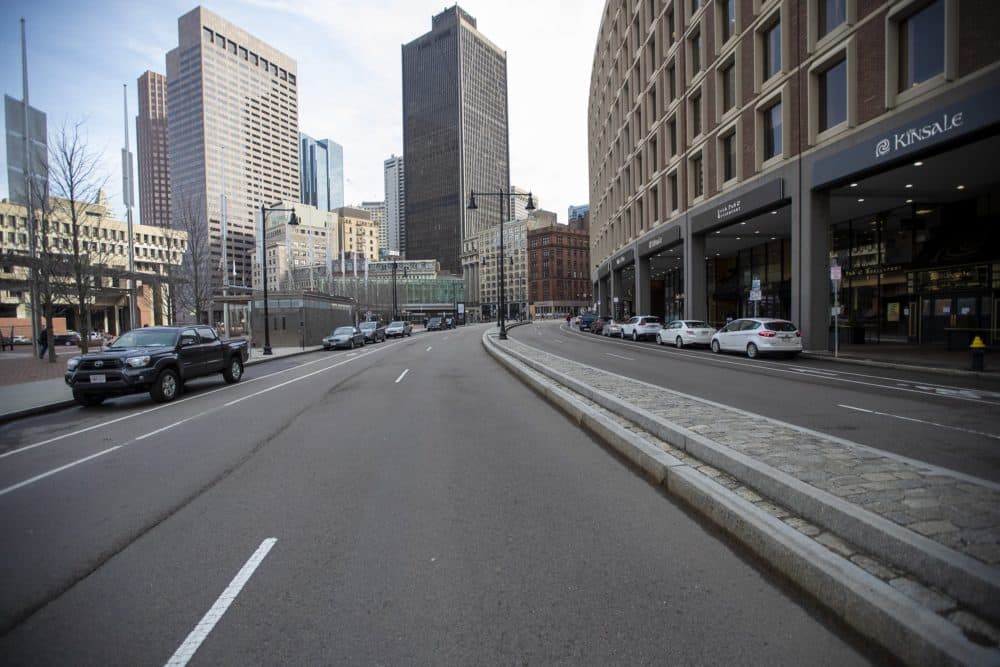 Five o'clock traffic on Cambridge Street in front of City Hall Plaza on Friday. (Jesse Costa/WBUR)