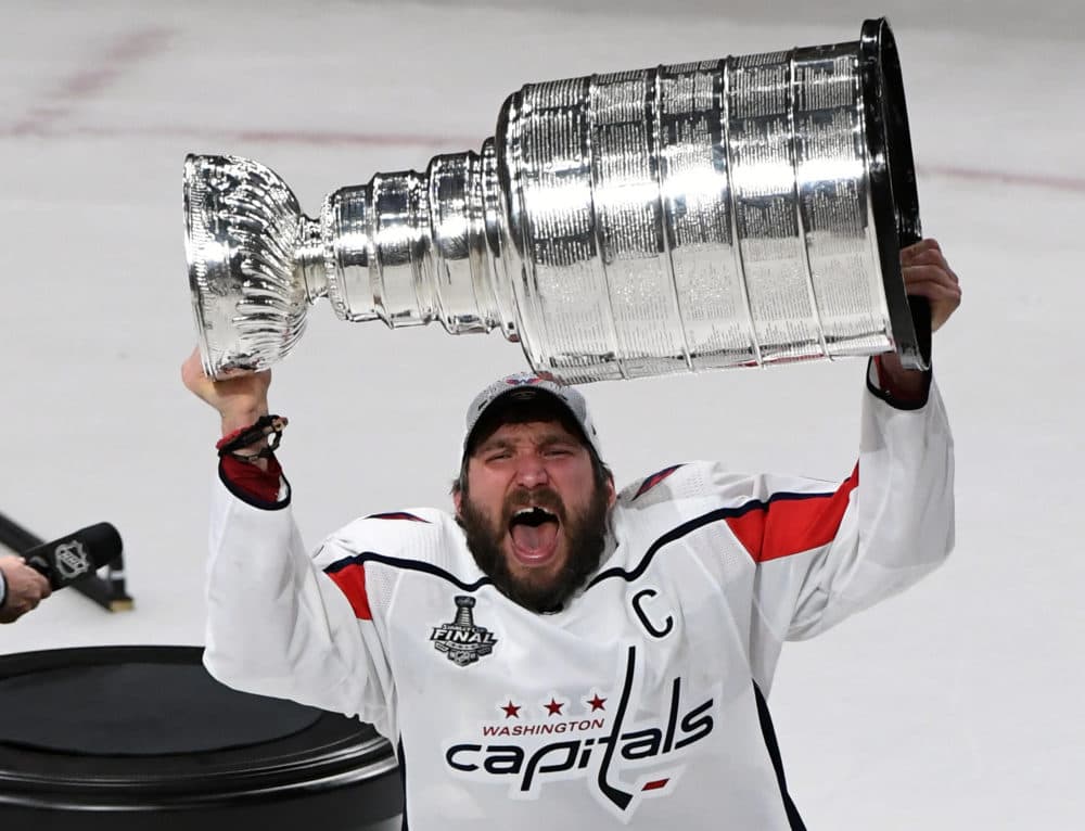 The words inscribed on the Stanley Cup trophy remembers the incomplete 1919 series. (Ethan Miller/Getty Images)