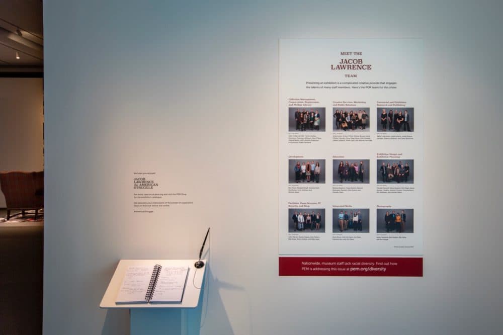 Visitors to the Jacob Lawrence show see a a photo of PEM's staff at the end of the exhibition. (Courtesy PEM)