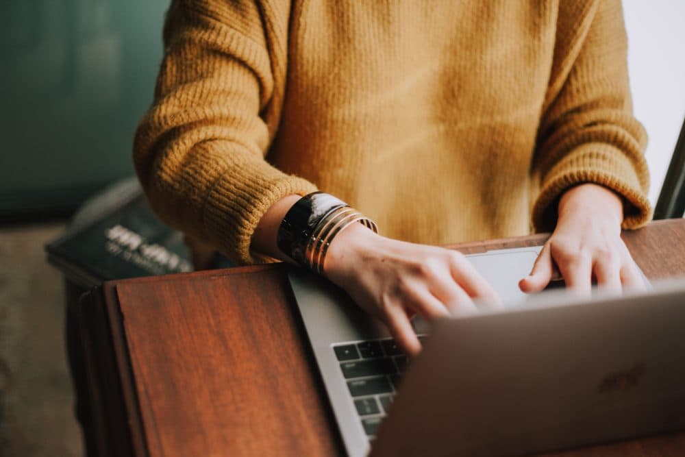 Each text, each silly emoji, reminds me that my people are out there, their cursors blinking in the darkness just like mine, writes Whitney Scharer. (Christin Hume/Unsplash)