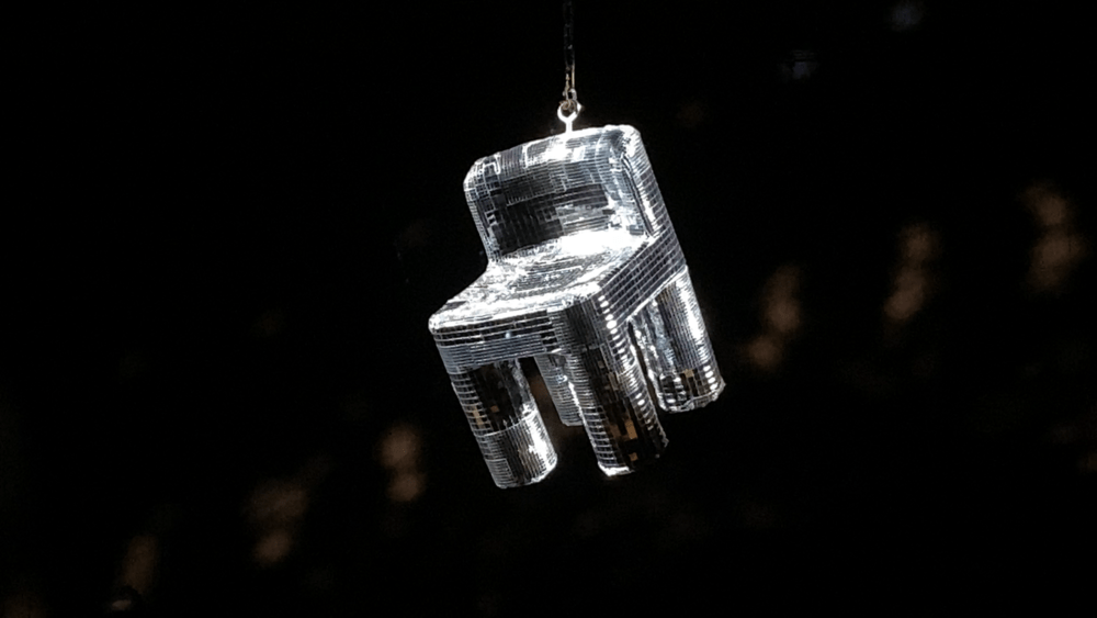 “Can You Hear Me Calling," by Ena Kantardžić, transforms a Little Tikes chair into a disco ball. (Courtesy Gideon West)