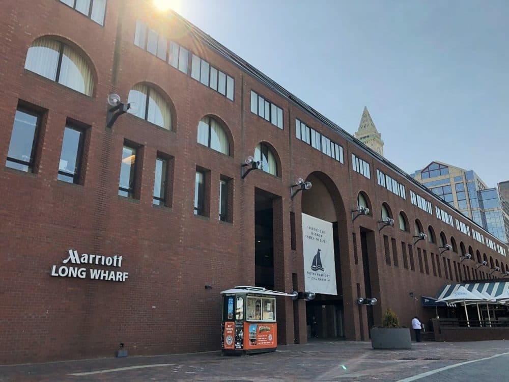 Most coronavirus cases in Massachusetts are linked to a Biogen conference held in late February at the Boston Marriott Long Wharf hotel. (Callum Borchers/WBUR)