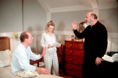 Director Rob Reiner (right) with Bruce Willis and Michelle Pfeiffer on the set of the 1999 film "The Story Of Us." (Getty Images)