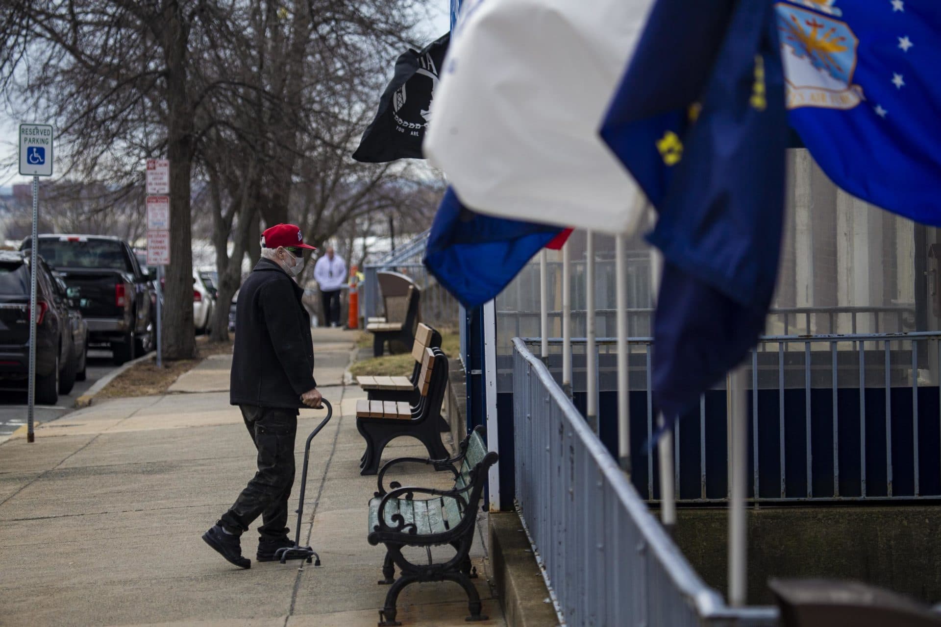 A resident enters the Soldiers’ Home in Chelsea. Eleven residents and two employees of the state-run skilled nursing and residential care for older veterans have tested positive for COVID-19; of those residents, two have died. (Jesse Costa/WBUR)