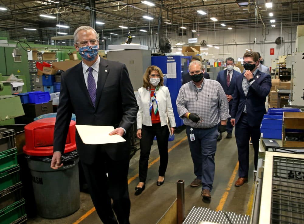 Gov. Charlie Baker and Lt. Gov. Karyn Polito toured Symmons Industries, a plumbing parts manufacturer in Braintree, on Wednesday to see firsthand how a local business is implementing new workplace safety standards. (Matt Stone/Boston Herald/Pool)