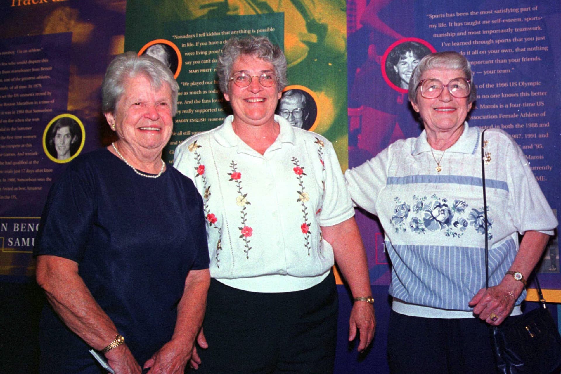 Former women's professional baseball players Mary Pratt, left, Marie Cronin, center, and Maddy English at the opening of the New England Women's Sports Hall of Fame. (AP Photo/Steven Tackeff, File)