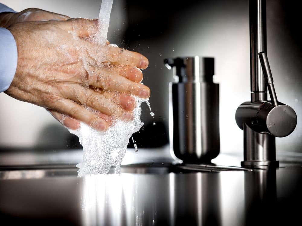 An illustraton picture shows a person washing their hands with disinfectant soap on March 4, 2020, in Heiloo. (Koen Van Weel/AFP)