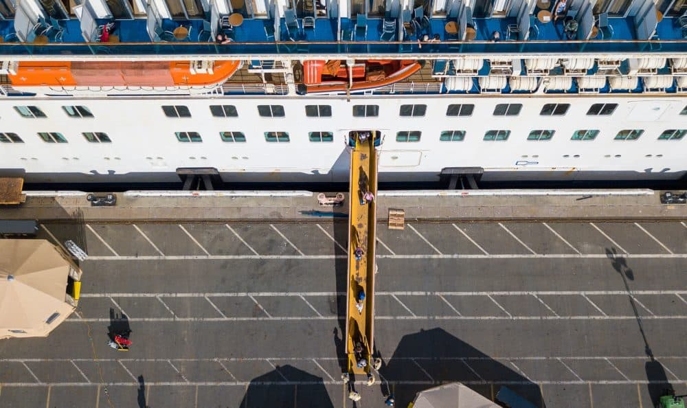 Passengers are disembarked from the Grand Princess cruise ship at the Port of Oakland in Oakland, California on March 10, 2020. (JOSH EDELSON/AFP via Getty Images)