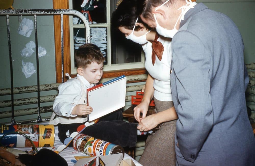 The author's then 4-year-old brother is pictured with their parents at the North Reading State Sanatorium, North Reading, Mass., at Christmastime 1956. (Cynthia Dockrell/Courtesy)