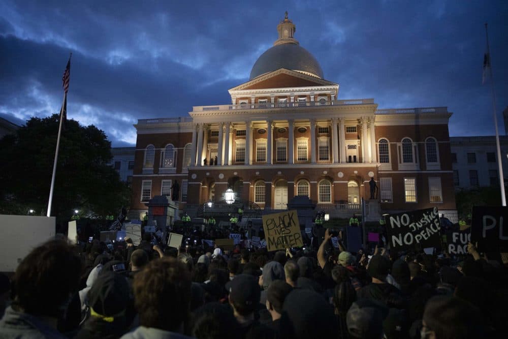 Black Lives Matter protesters outside the State House, before the march devolved into destruction and clashes with police. (Robin Lubbock/WBUR)