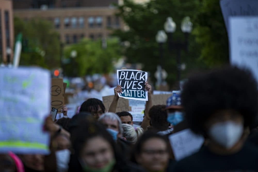 Thousands of Protesters March up Washington Street on their way to rally at the Massachusetts State House, Sunday, May 31, 2020. (Jesse Costa/WBUR)