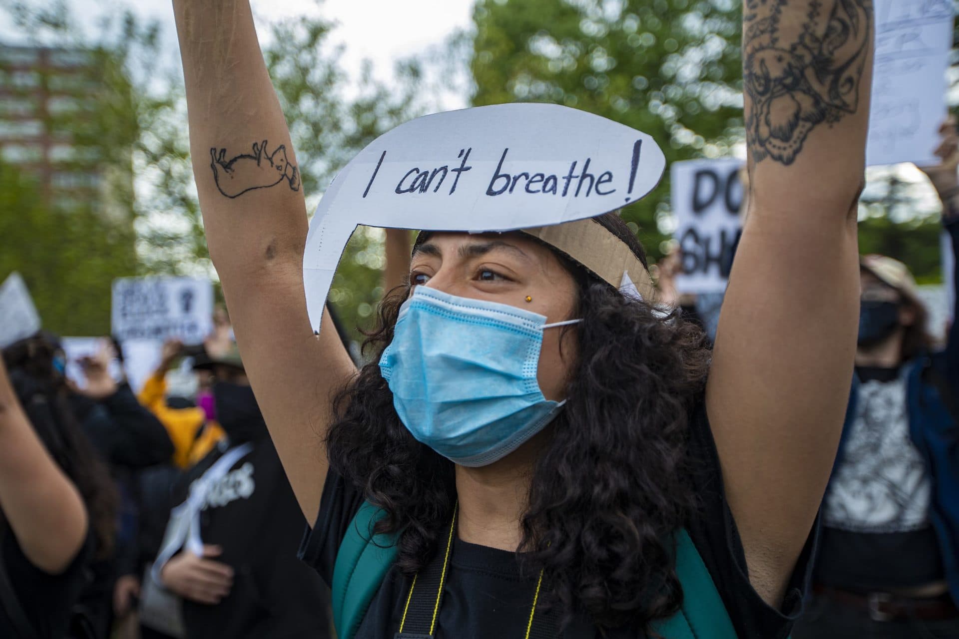 Thousands of protesters marched to Shattuck Picnic Grove in Franklin Park during the vigil. (Jesse Costa/WBUR)