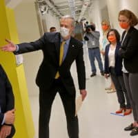 Gov. Charlie Baker gave his Friday afternoon news conference after touring Cambridge's LabCentral, a launchpad for biotech and life sciences startups. (Matt Stone/Boston Herald/Pool)