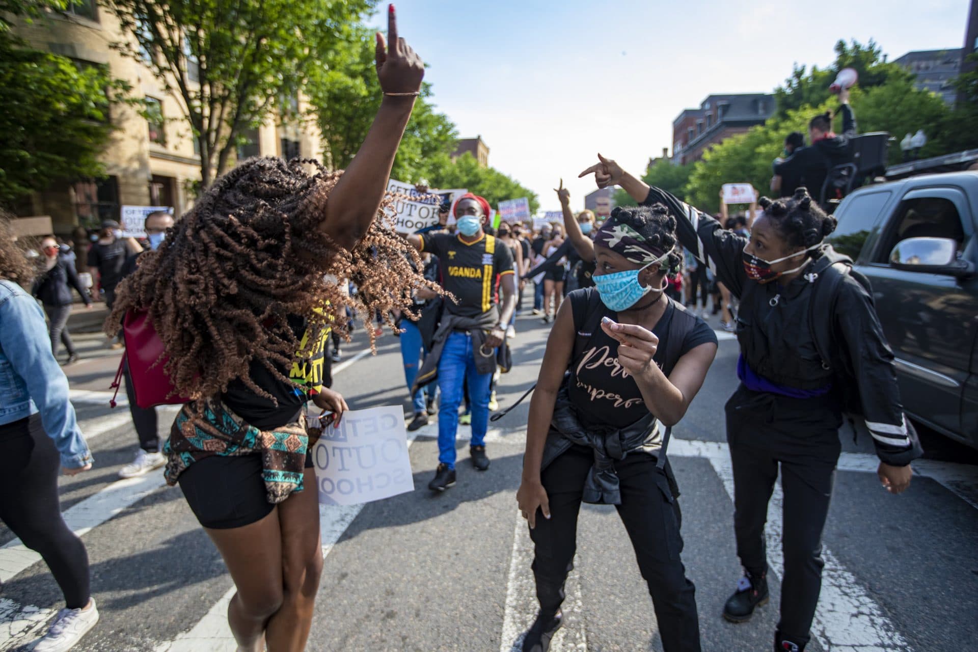 Protesters danced while marching up Washington Street en route to Boston City Hall during the F.T.P. March to Defund Police and Fund Our Communities. (Jesse Costa/WBUR)