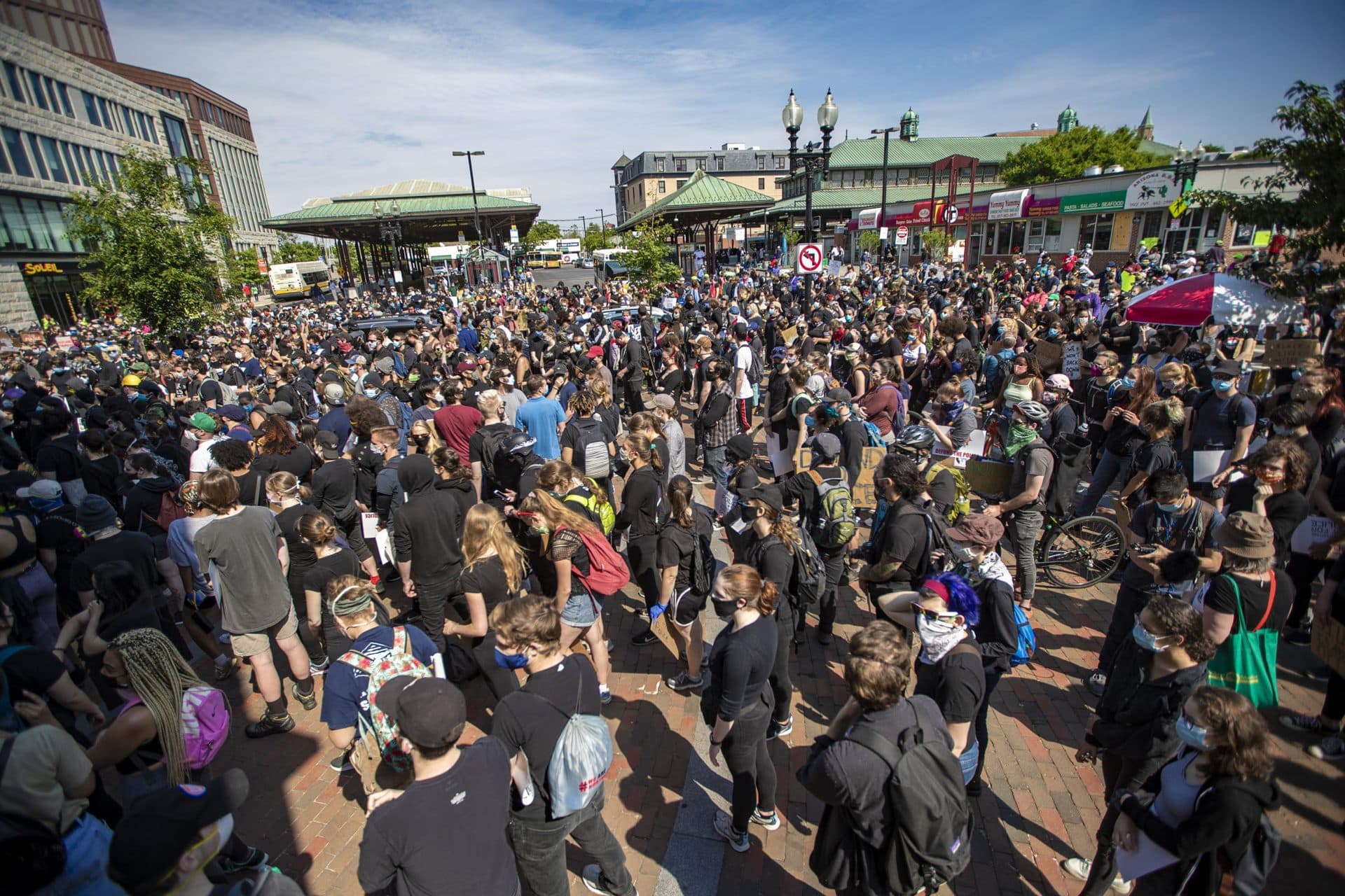 Hundreds of protesters gathered in Nubian Square to listen to speakers before leaving for the F.T.P. March to Defund Police and Fund Our Communities. (Jesse Costa/WBUR)