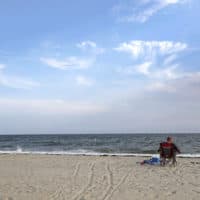 The view at Covell Beach in Centerville, Mass. Vineyard Winds' proposed buried energy cables would stretch from offshore wind turbines, through the ocean, under the sand and parking lot at Covell Beach. (Elise Amendola/AP)