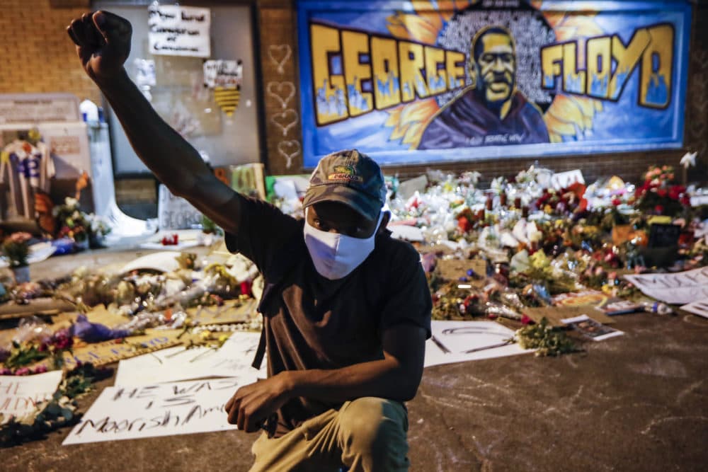 Protesters gather at a memorial for George Floyd where he died outside Cup Foods on East 38th Street and Chicago Avenue, Monday, June 1, 2020, in Minneapolis. (John Minchillo/AP)