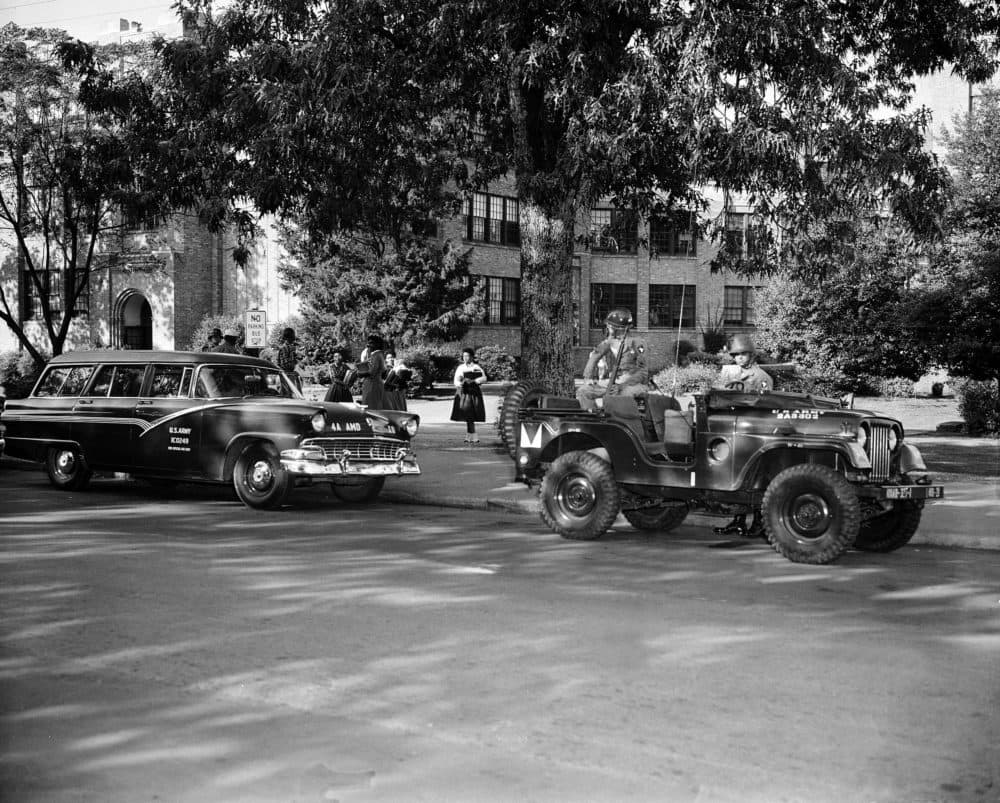 Five young black students leave a U.S. Army stationwagon as they arrive at Central High School in Little Rock, Ark. on September 30, 1957, during their first full week of classes. They are escorted to school by federal troops enforcing integration of the previously all-white school. (AP)