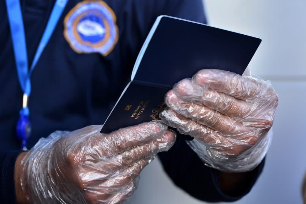 Some countries are considering issuing something called an immunity passport — a document certifying that the person recovered from COVID-19 and now has immunity. (Orlando Sierra/AFP/Getty Images)