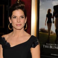 Sports movies like "The Blind Side" help create a lot of the myths about sports and race. (Stephen Lovekin/Getty Images)