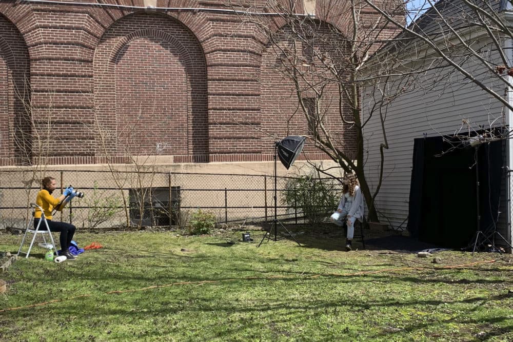Katherine Taylor photographing in her backyard studio for the project "Who Do You Wear a Mask For?" (Courtesy Maria Freda)